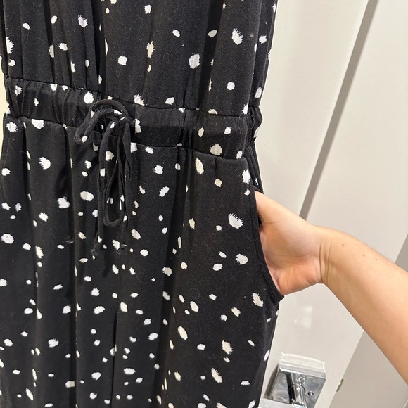 Black and white flowy jumpsuit- size small. Has pockets. - Picture 3 of 5